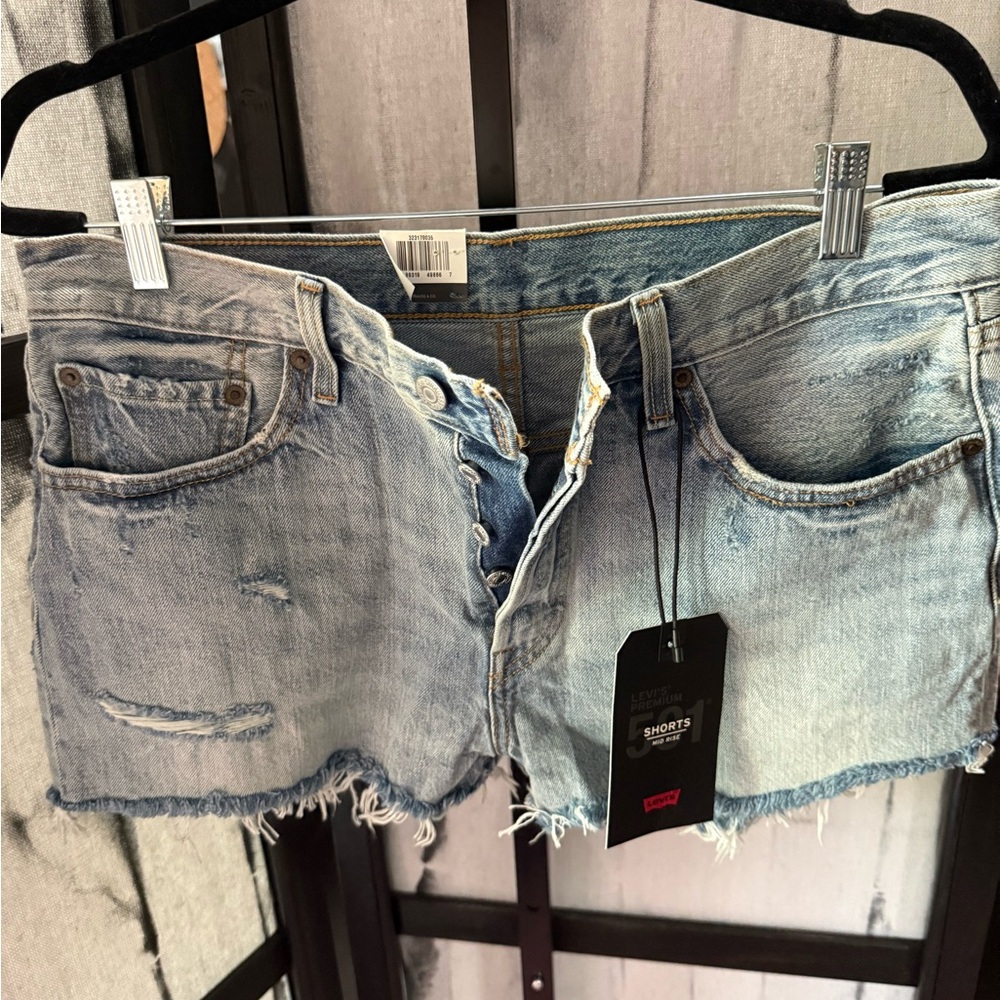 Levi’s Distressed Light Blue Denim Shorts